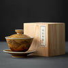 Complete tea bowl set with saucer in a wooden box.