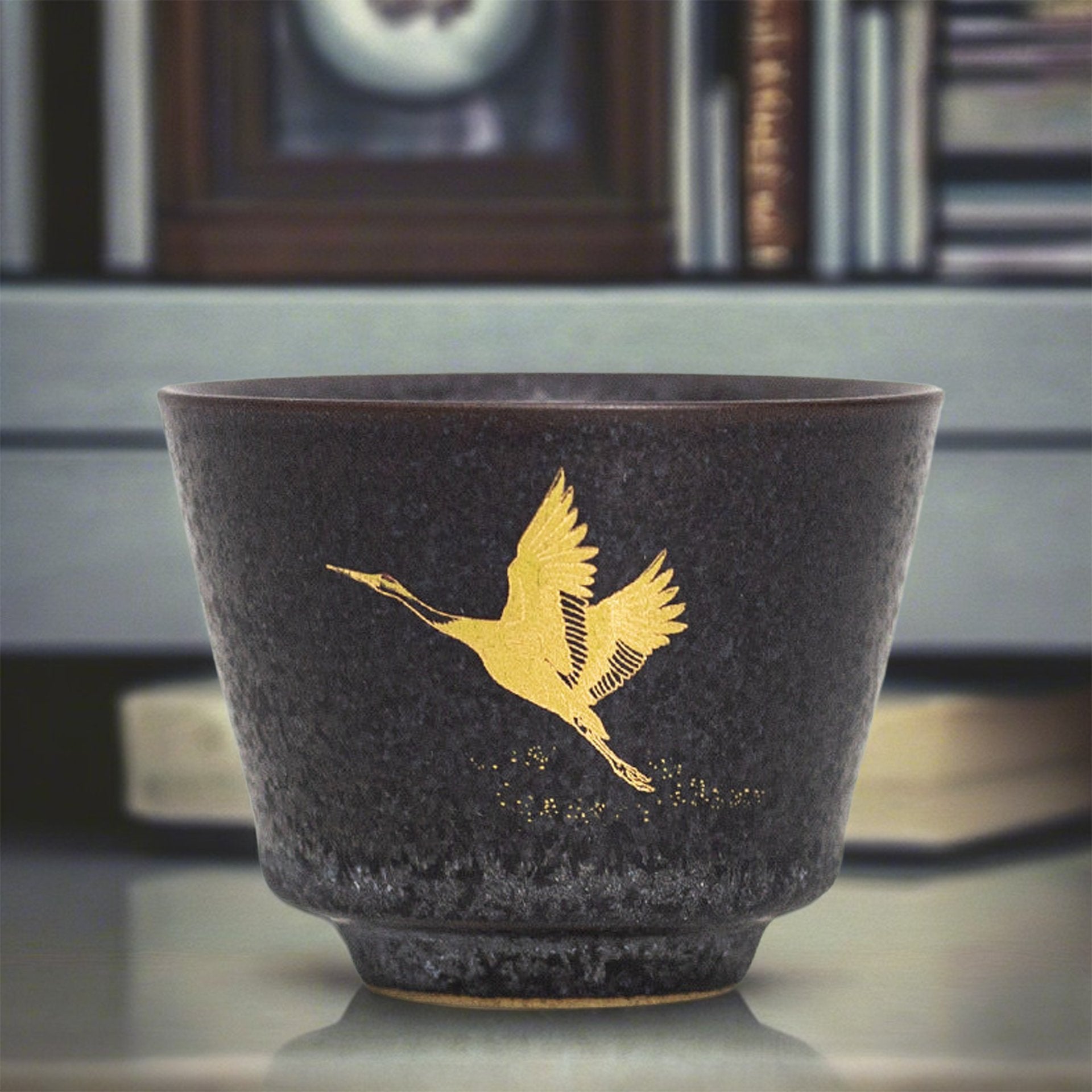 Dark Japanese teacup.