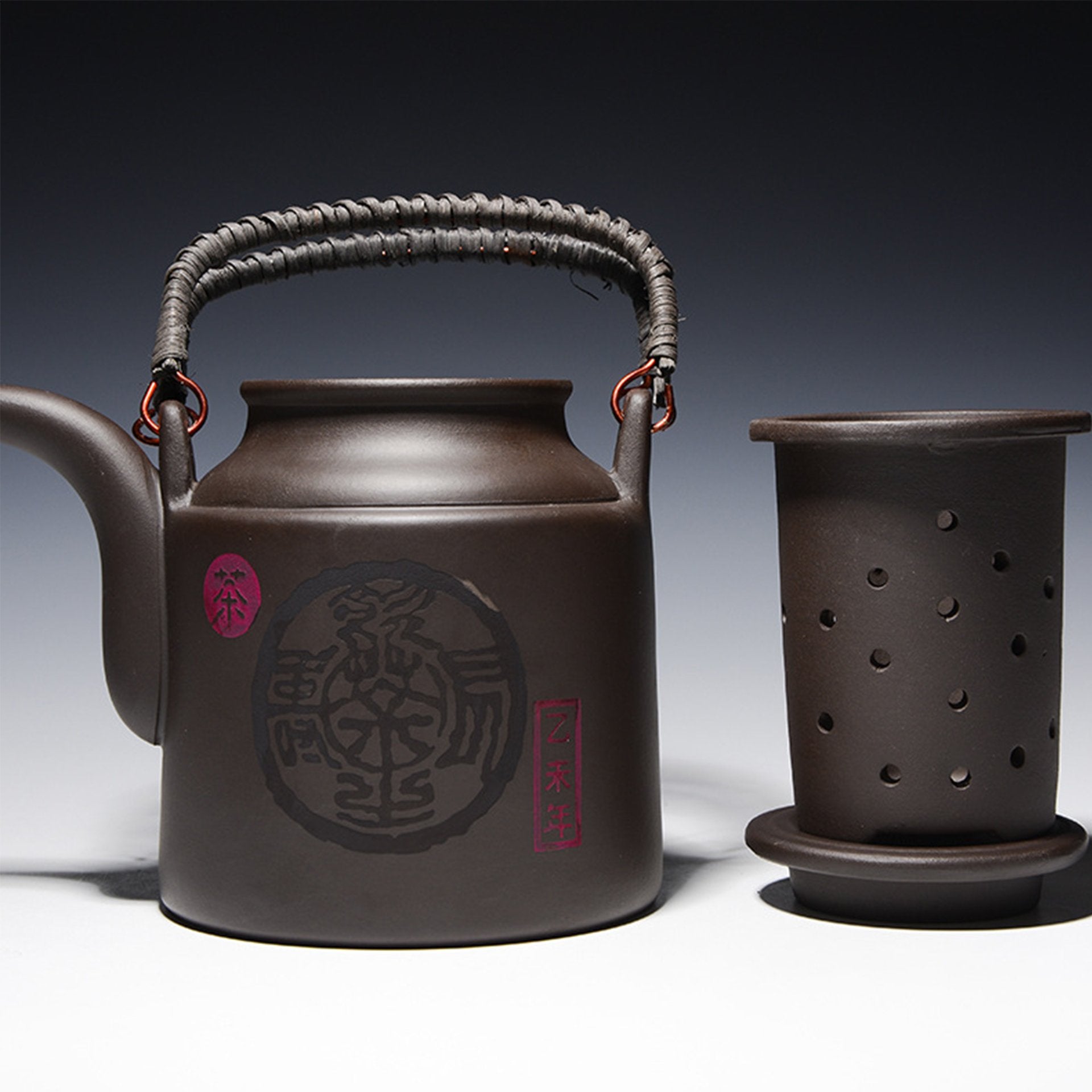 Detail of dark brown teapot's filter inside the lid.